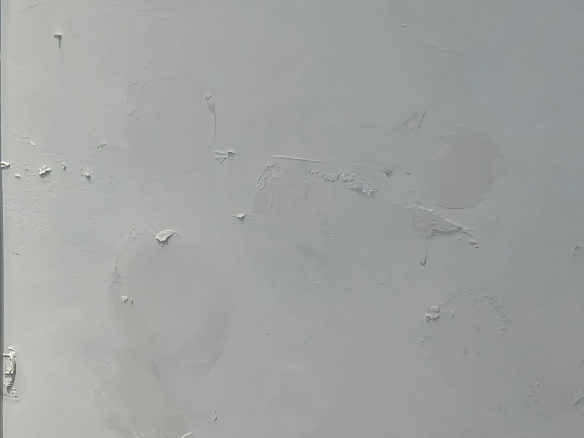 Antes: Pared con revoque dañado